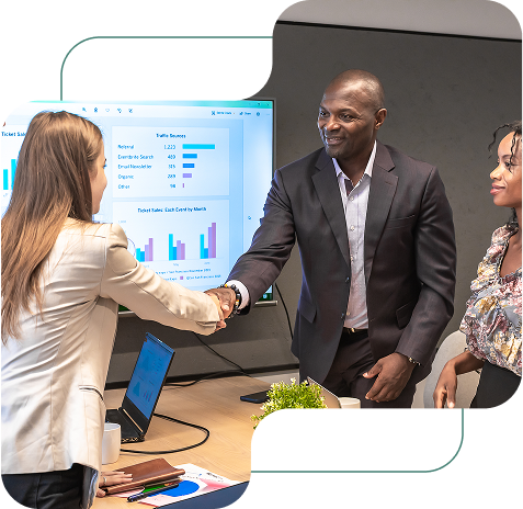 Business professionals in a meeting discussing compliance solutions
